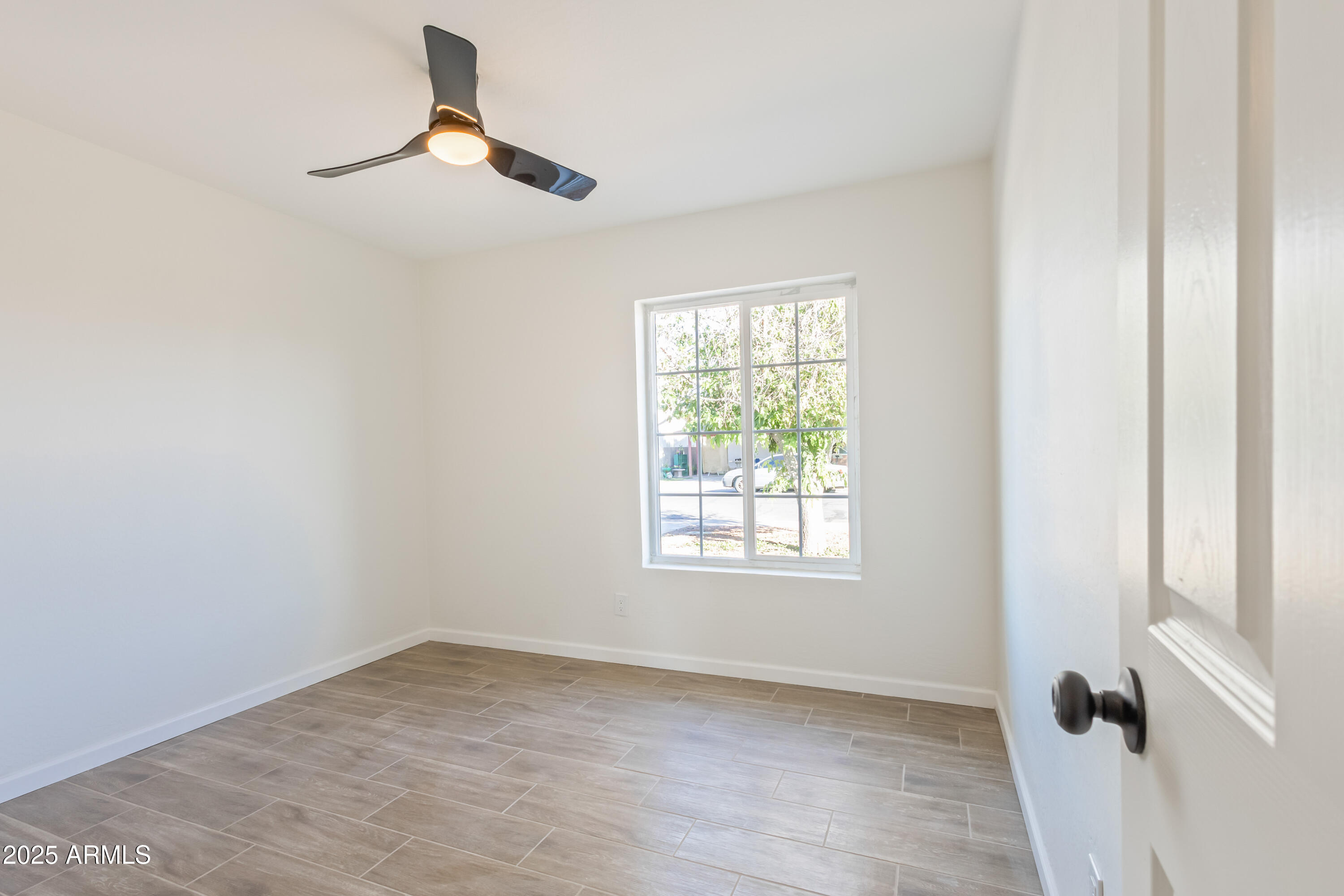 1022 South Allen Mesa, AZ 85204 - Photo 25 of 38 an empty room with a window