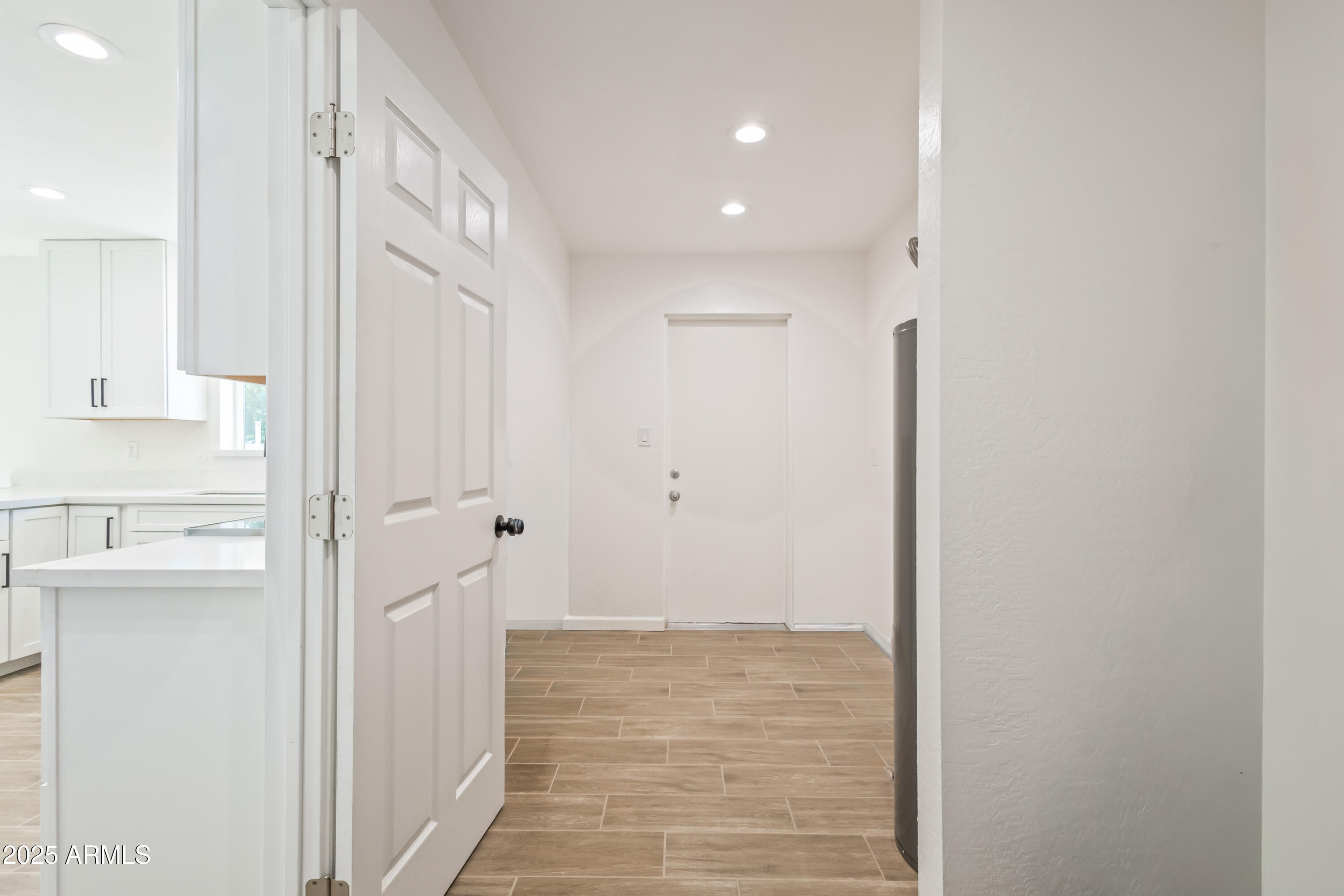 1022 South Allen Mesa, AZ 85204 - Photo 29 of 38 a view of a hallway with wooden floor and cabinet