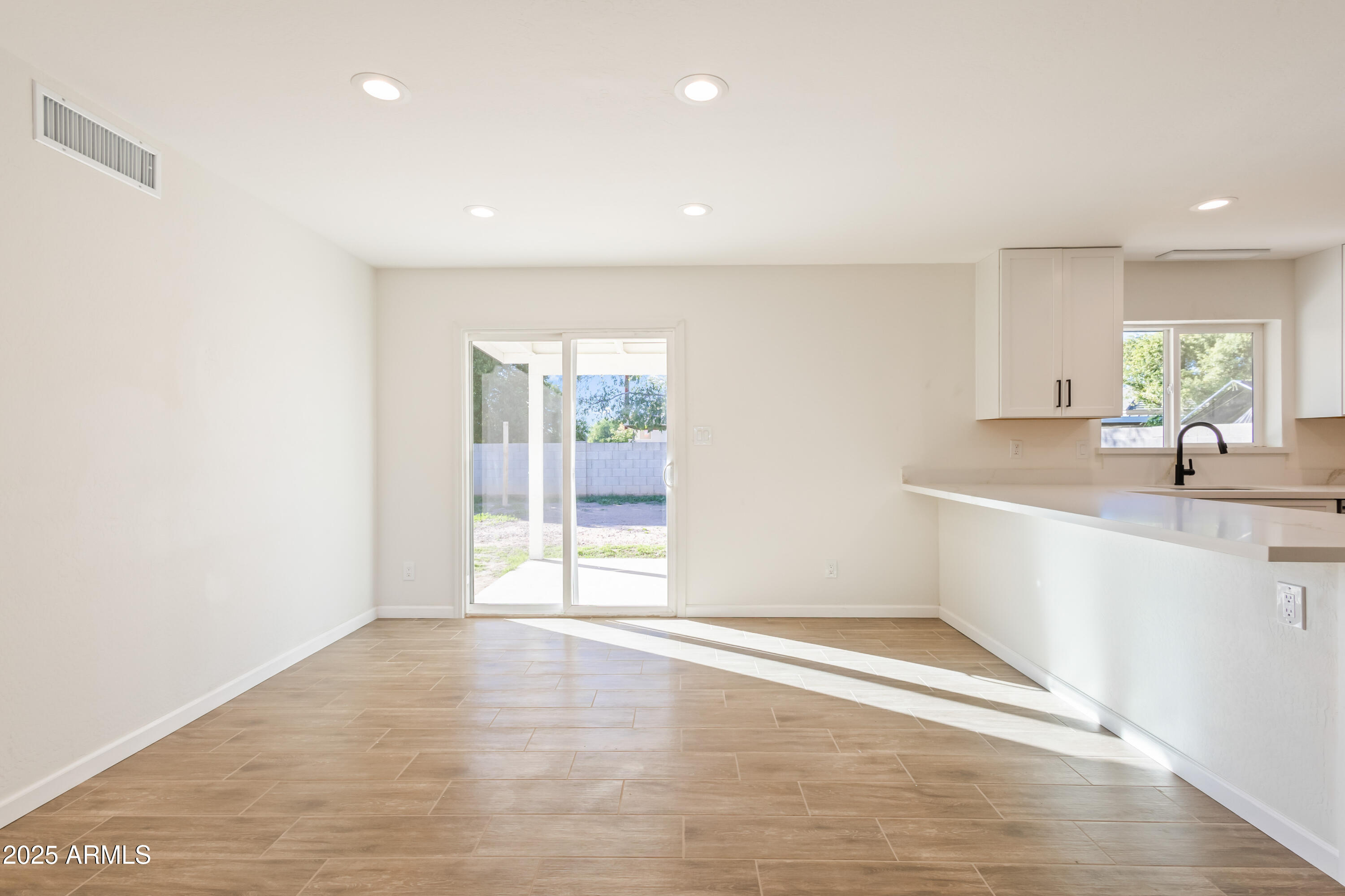 1022 South Allen Mesa, AZ 85204 - Photo 10 of 38 a view of a kitchen with a sink and a window