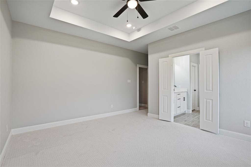 420 Ball Street Tom Bean, TX 75491 - Photo 13 of 34 an empty room with chandelier fan