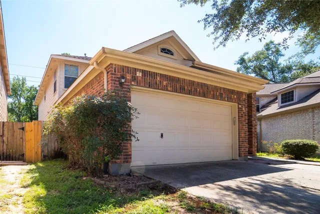 a view of a white house with a outdoor space
