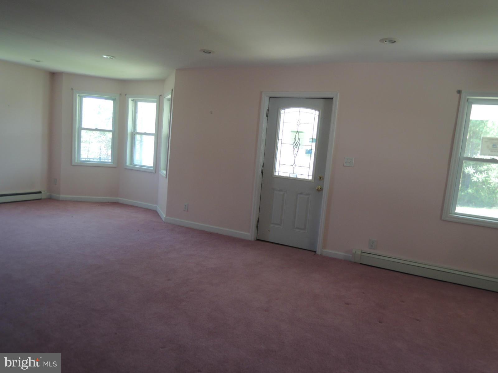 2262 County Rte 1/1 Berkeley Springs, WV 25411 - Photo 9 of 30 Family Room