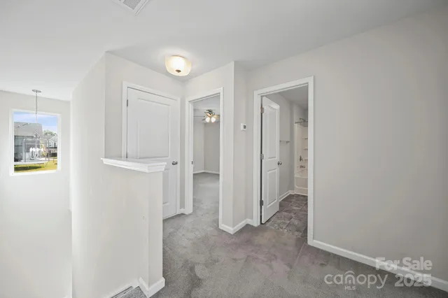 a view of a house with a yard and a table