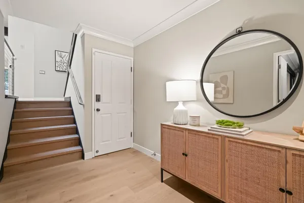 a view of a hallway with washer and dryer