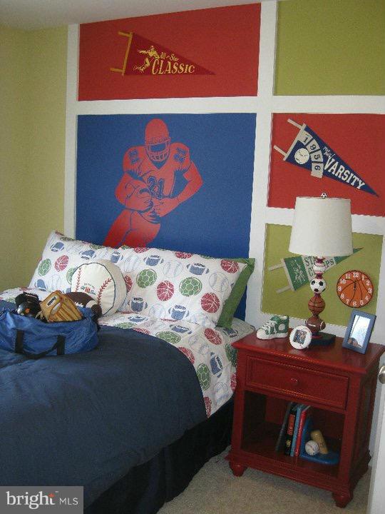 Rock Spring Forest Hill, MD 21050 - Photo 12 of 22 a bedroom with a bed and a table