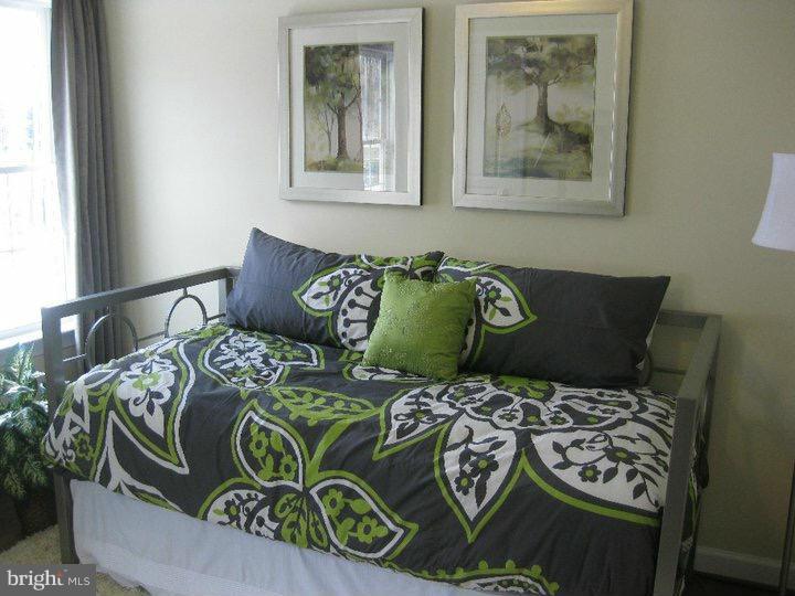 Rock Spring Forest Hill, MD 21050 - Photo 14 of 22 a bed sitting in a bedroom next to a window