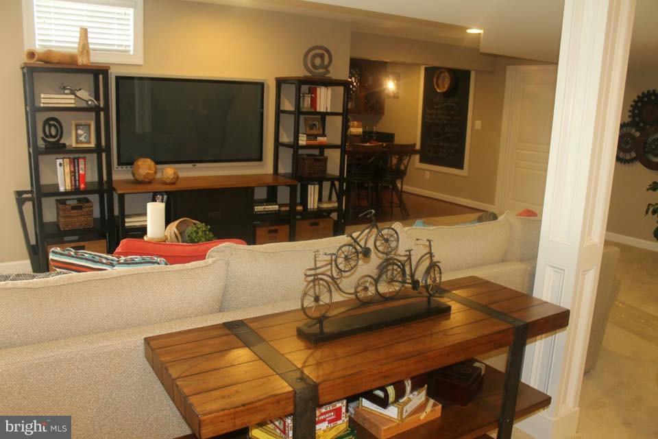 Rock Spring Forest Hill, MD 21050 - Photo 16 of 22 a living room with furniture and a flat screen tv