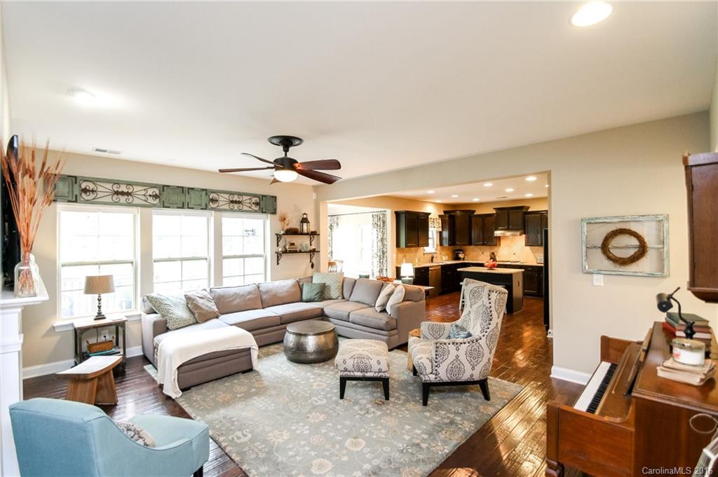 662 Reliance Court, Unit 13 Tega Cay, SC 29708 - Photo 9 of 24 a living room with furniture and a large window