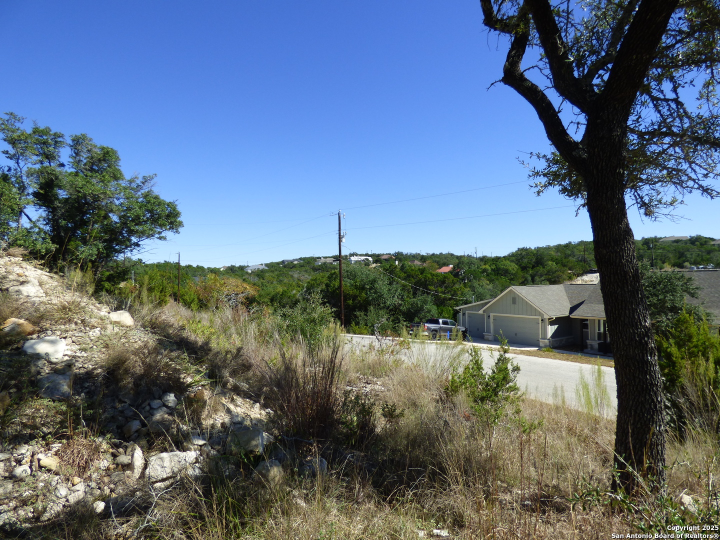 198 Magnolia Meadow Spring Branch, TX 78070 - Photo 8 of 10 a view of lake with green space