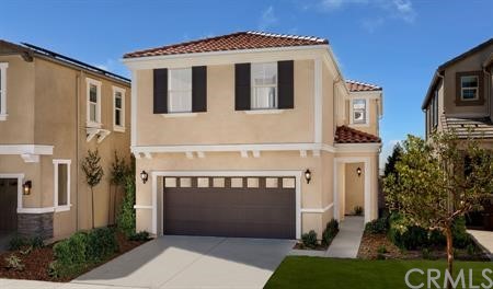 a front view of a house with a garage