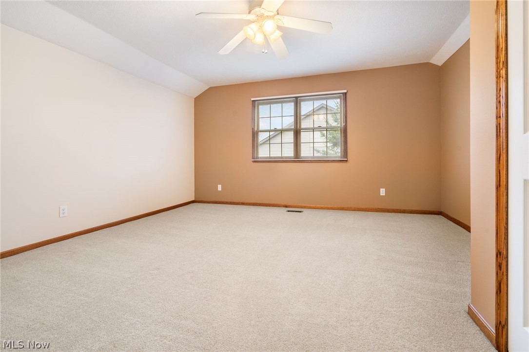 2414 Charing Cross Road Northwest Canton, OH 44708 - Photo 30 of 36 Upstairs bedroom with light colored carpet, and ceiling fan