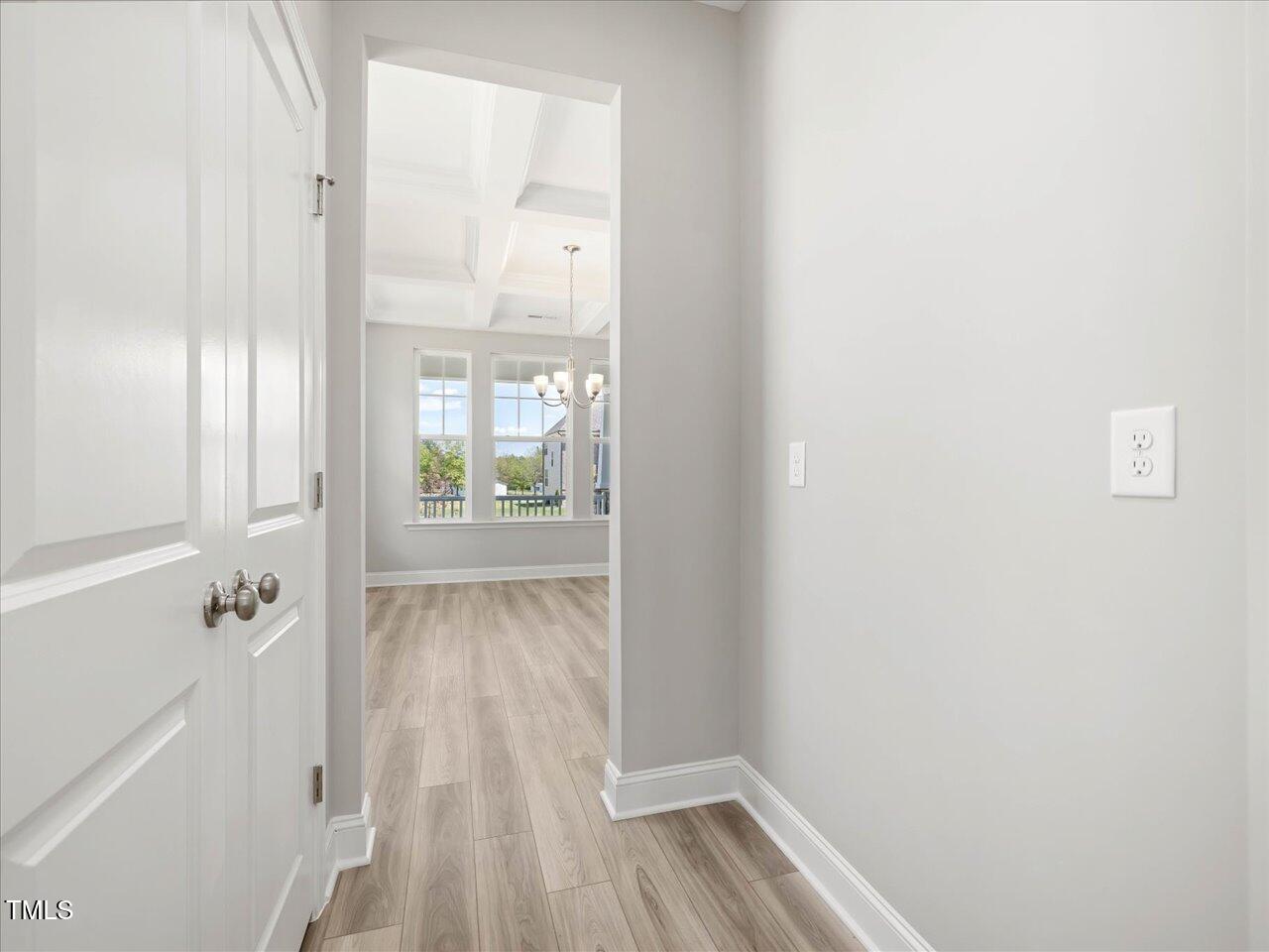 63 Biscayne Court Angier, NC 27501 - Photo 12 of 52 a view of a room with wooden floor and windows