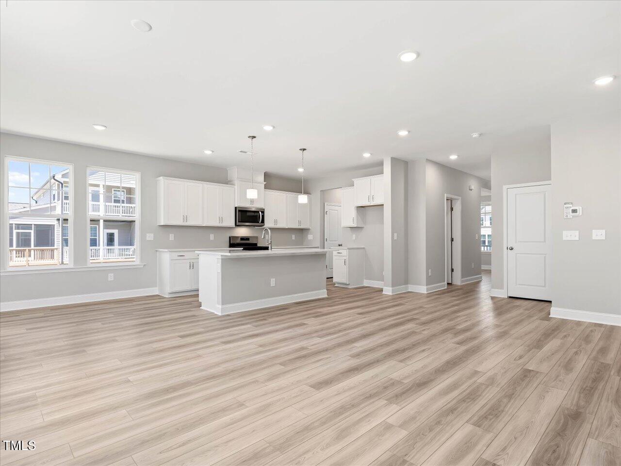 63 Biscayne Court Angier, NC 27501 - Photo 16 of 52 a view of kitchen with wooden floor
