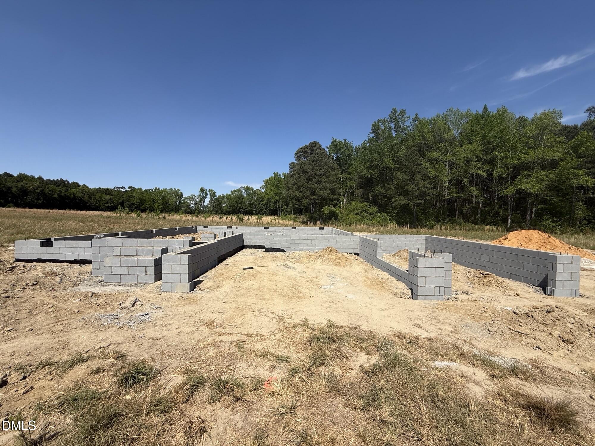 63 Biscayne Court Angier, NC 27501 - Photo 3 of 52 a swimming pool with an ocean view