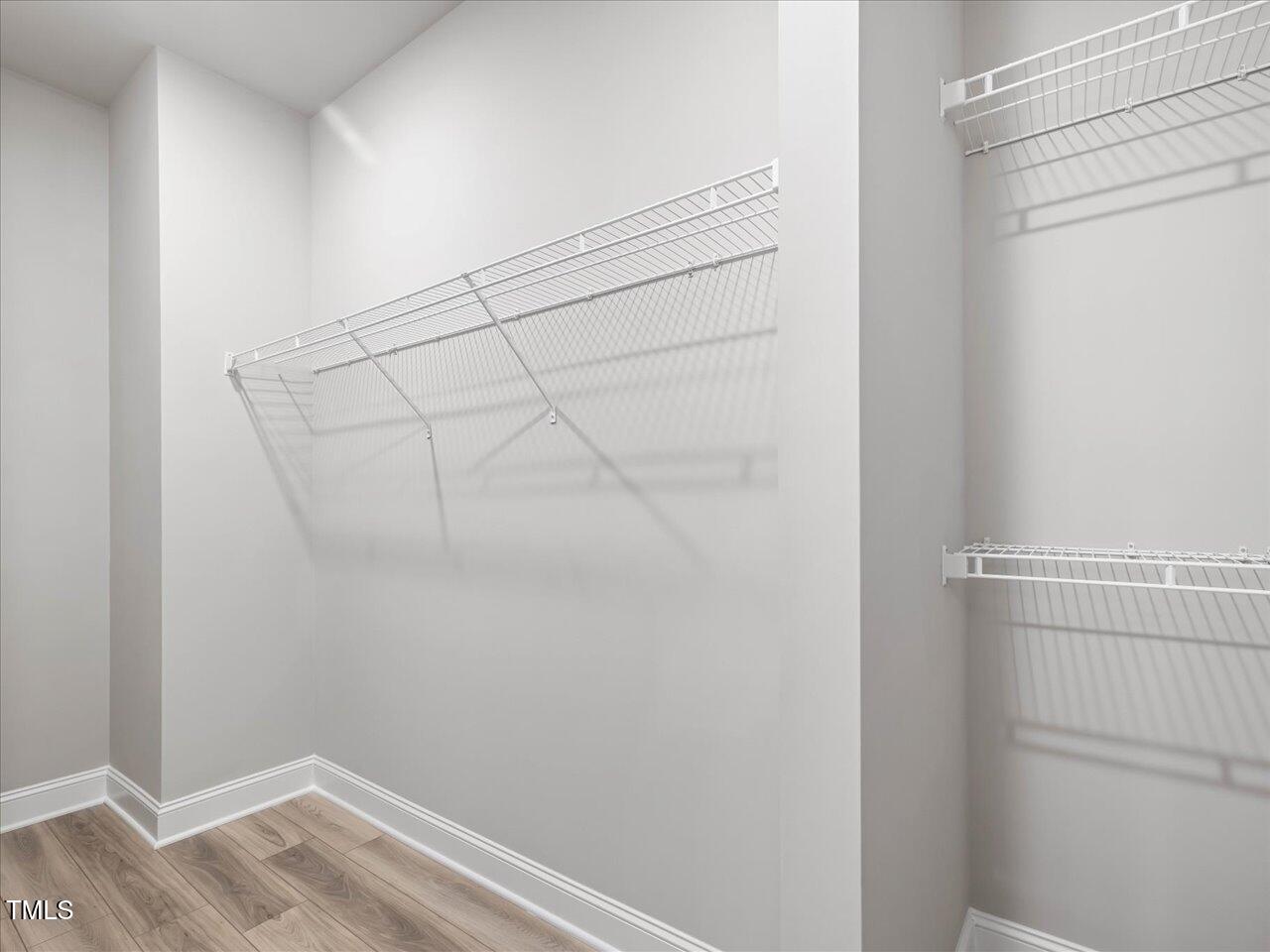 63 Biscayne Court Angier, NC 27501 - Photo 32 of 52 a view of a room with racks on the wall