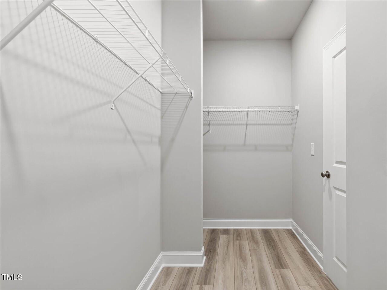 63 Biscayne Court Angier, NC 27501 - Photo 33 of 52 a view of a room with racks on the wall