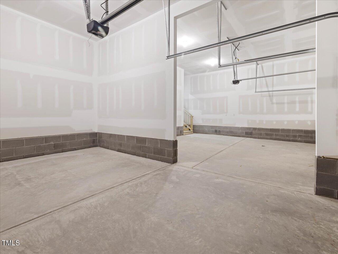 63 Biscayne Court Angier, NC 27501 - Photo 37 of 52 a bathroom with a glass shower door