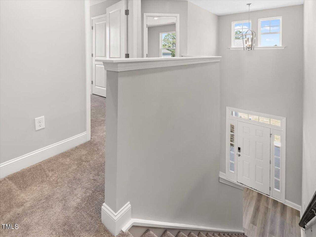 63 Biscayne Court Angier, NC 27501 - Photo 40 of 52 an entryway with wooden floor and cabinet
