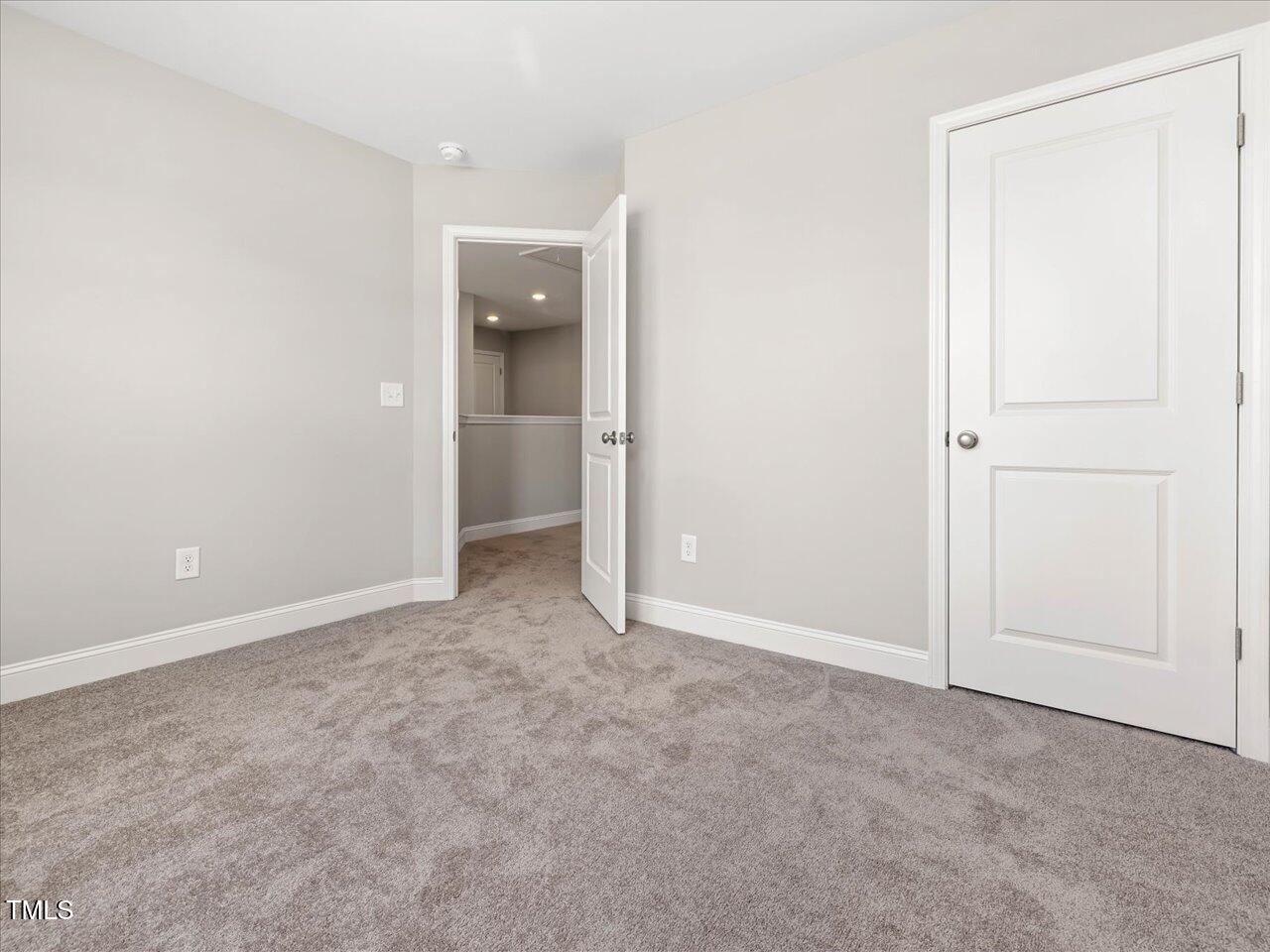 63 Biscayne Court Angier, NC 27501 - Photo 43 of 52 an empty room with an entryway