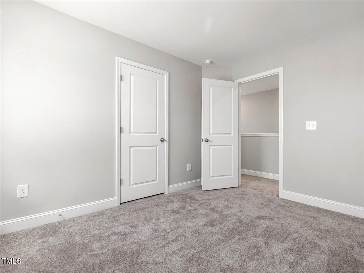 63 Biscayne Court Angier, NC 27501 - Photo 45 of 52 an empty room with closet area
