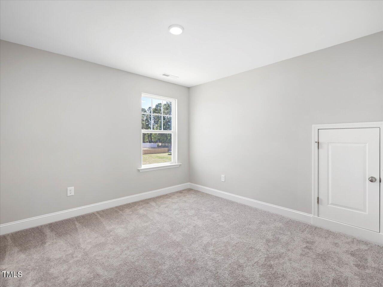 63 Biscayne Court Angier, NC 27501 - Photo 49 of 52 an empty room with windows