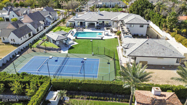 4425 North Arcadia Lane Phoenix, AZ 85018 - Photo 115 of 138 an aerial view of a house with a garden and swimming pool