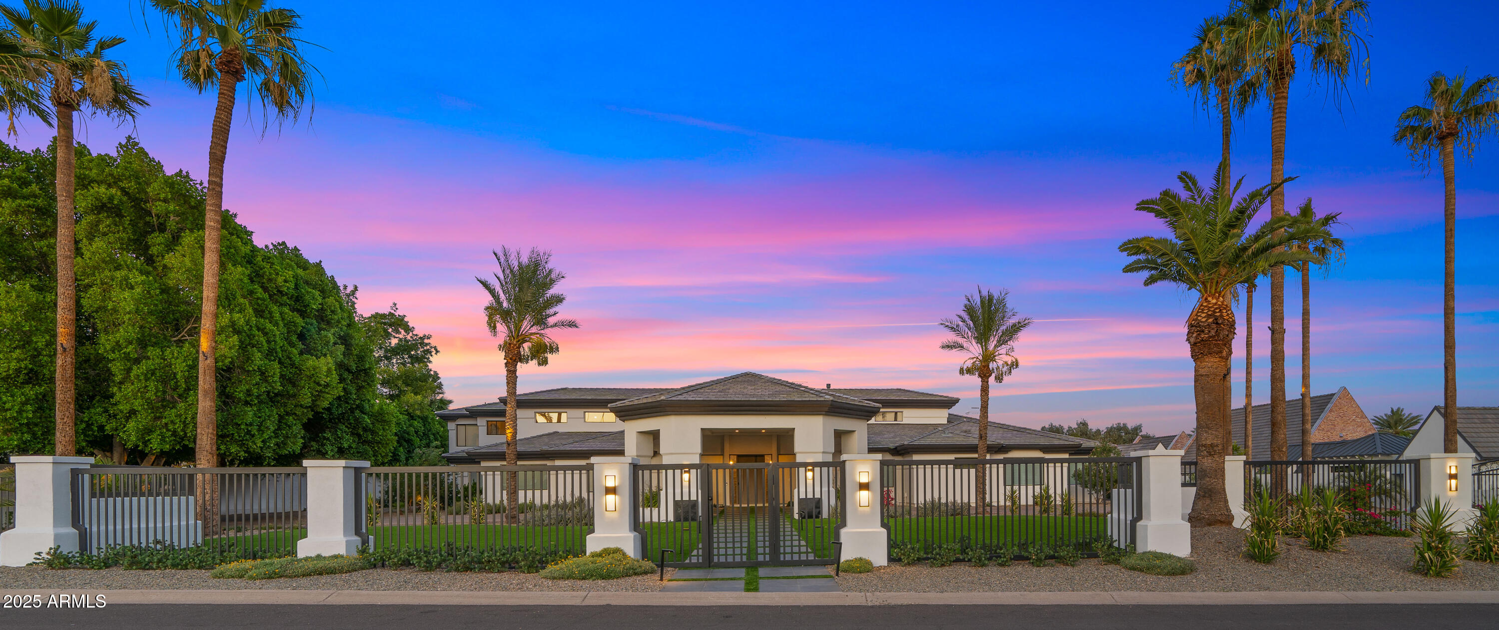 4425 North Arcadia Lane Phoenix, AZ 85018 - Photo 128 of 138 a front view of a house with a garden