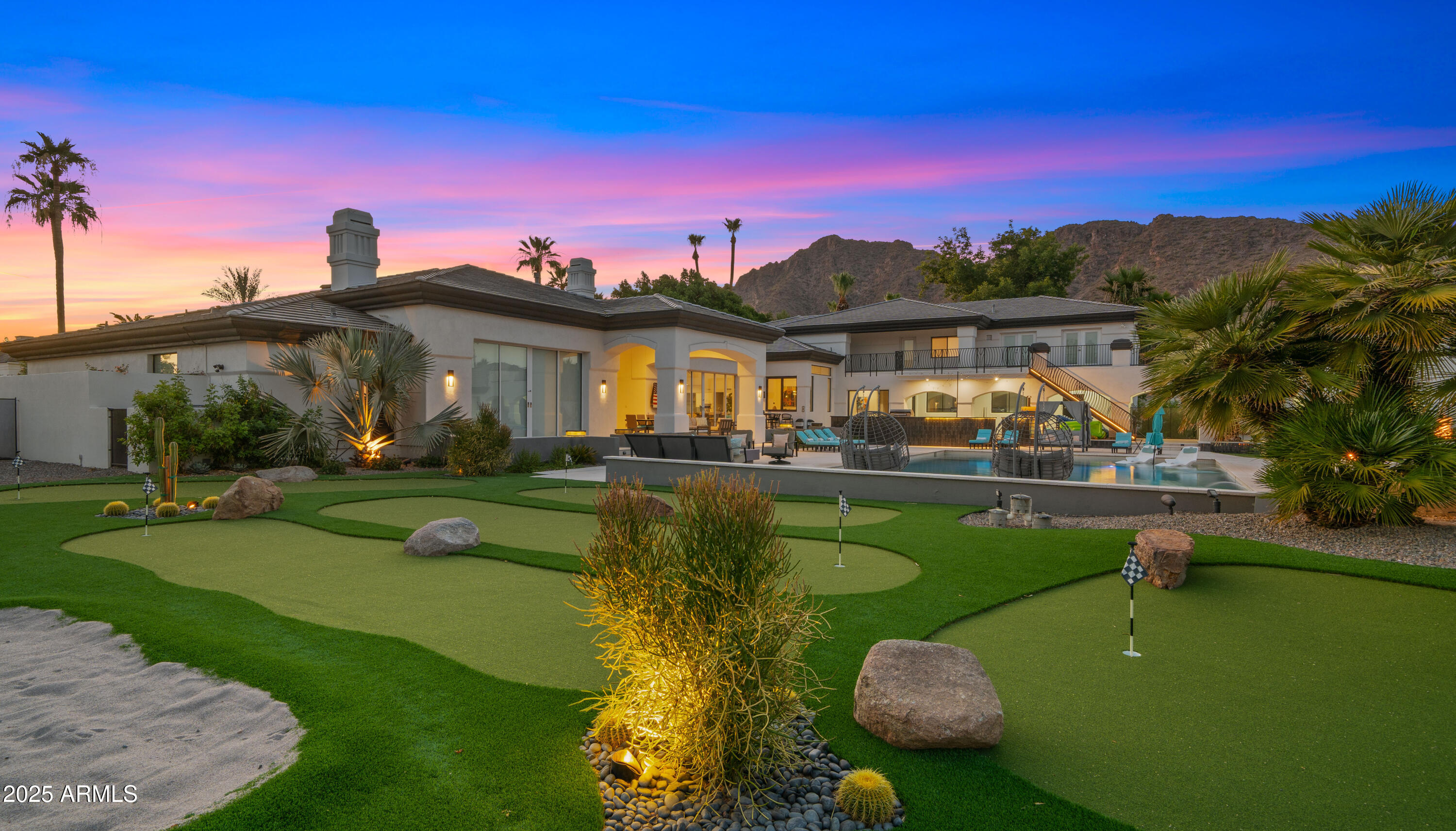 4425 North Arcadia Lane Phoenix, AZ 85018 - Photo 132 of 138 a view of a swimming pool with a patio
