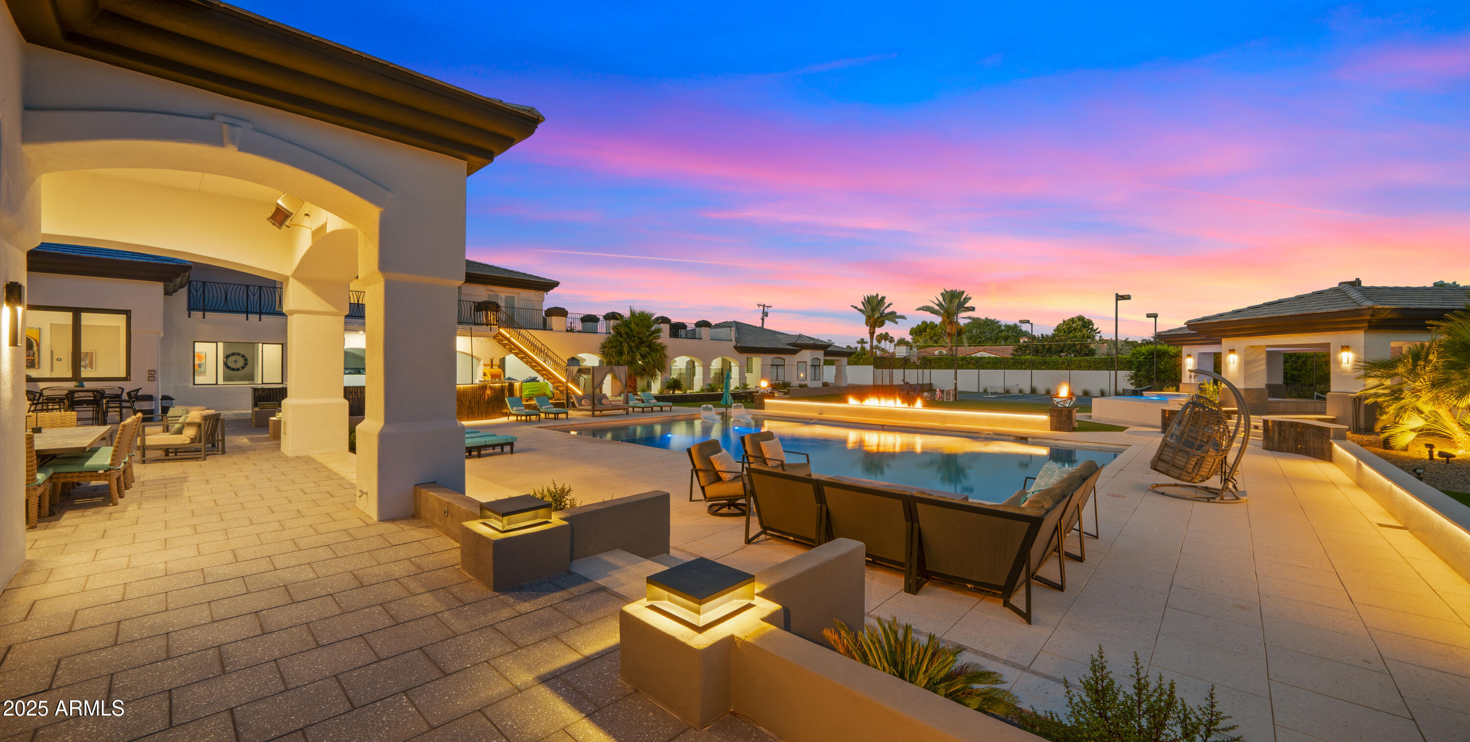 4425 North Arcadia Lane Phoenix, AZ 85018 - Photo 137 of 138 a view of a swimming pool with a lounge chair and floor to ceiling fan