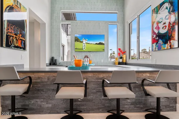 a bedroom with a bed and dresser