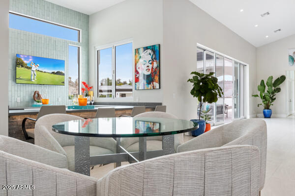 4425 North Arcadia Lane Phoenix, AZ 85018 - Photo 36 of 138 a living room with furniture and a potted plant