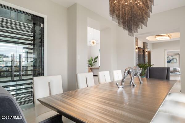 4425 North Arcadia Lane Phoenix, AZ 85018 - Photo 39 of 138 a dining room with furniture and wooden floor