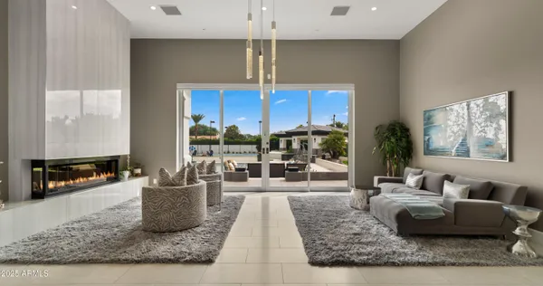 a view of a swimming pool with a patio