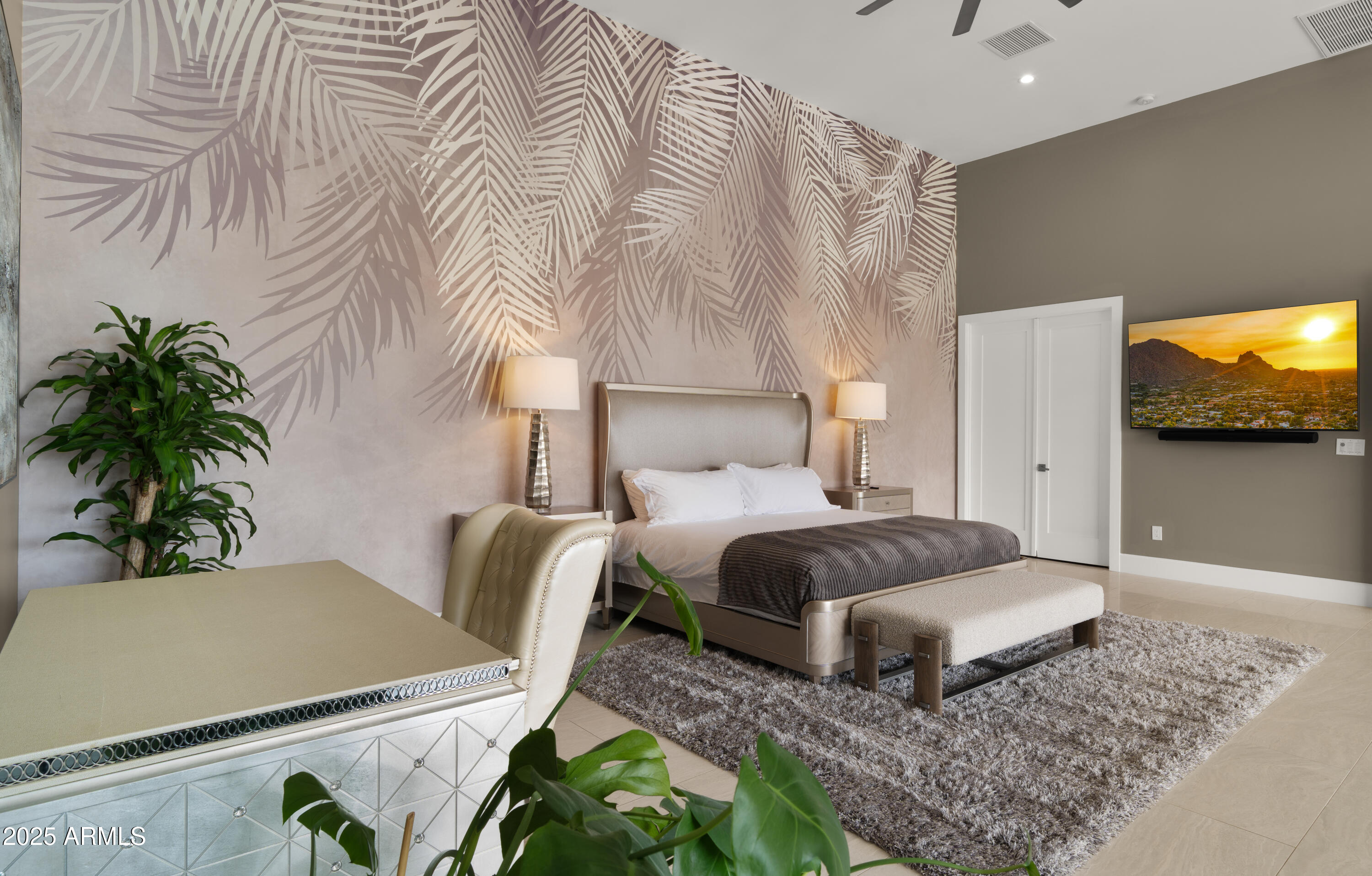 4425 North Arcadia Lane Phoenix, AZ 85018 - Photo 52 of 138 a bedroom with a bed and a couch