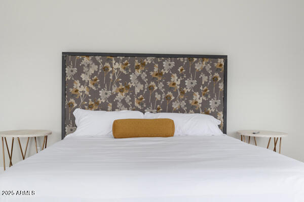 4425 North Arcadia Lane Phoenix, AZ 85018 - Photo 89 of 138 a bedroom with a large bed and a window