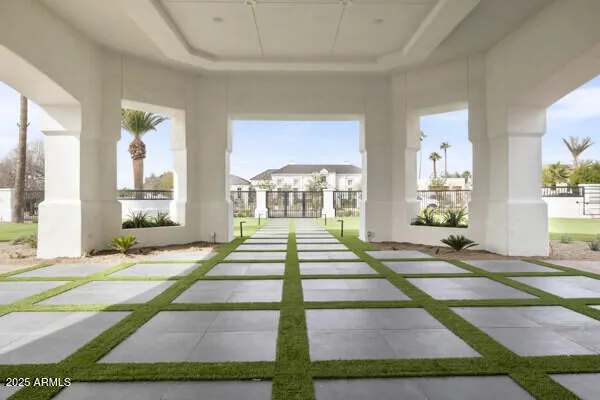 a kitchen with a refrigerator a sink and cabinets