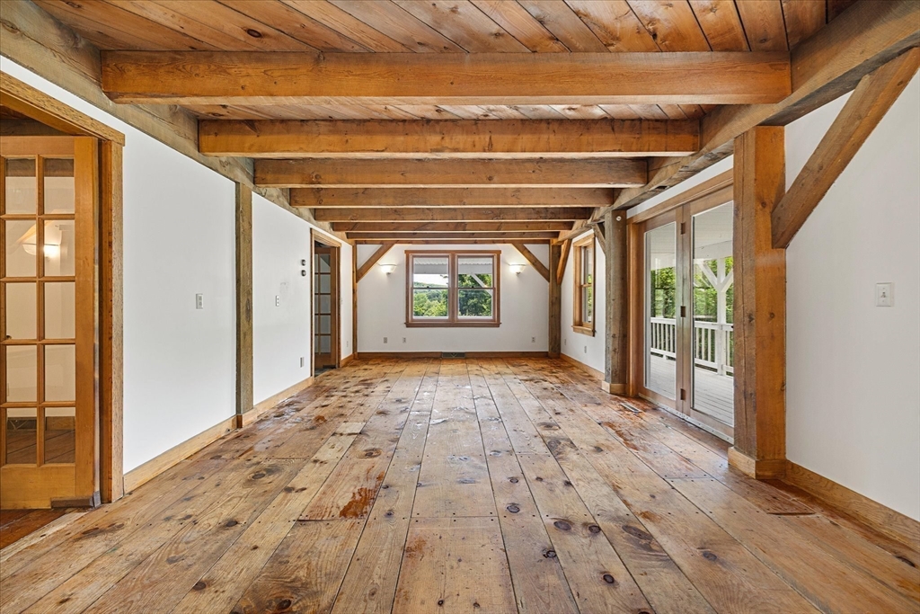 168 O'Neil Road West Warren, MA 01092 - Photo 12 of 42 a view of empty room with wooden floor