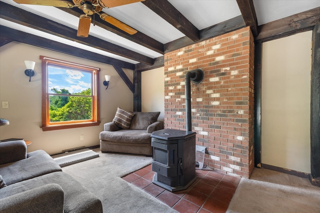 168 O'Neil Road West Warren, MA 01092 - Photo 33 of 42 a living room with furniture and a large window