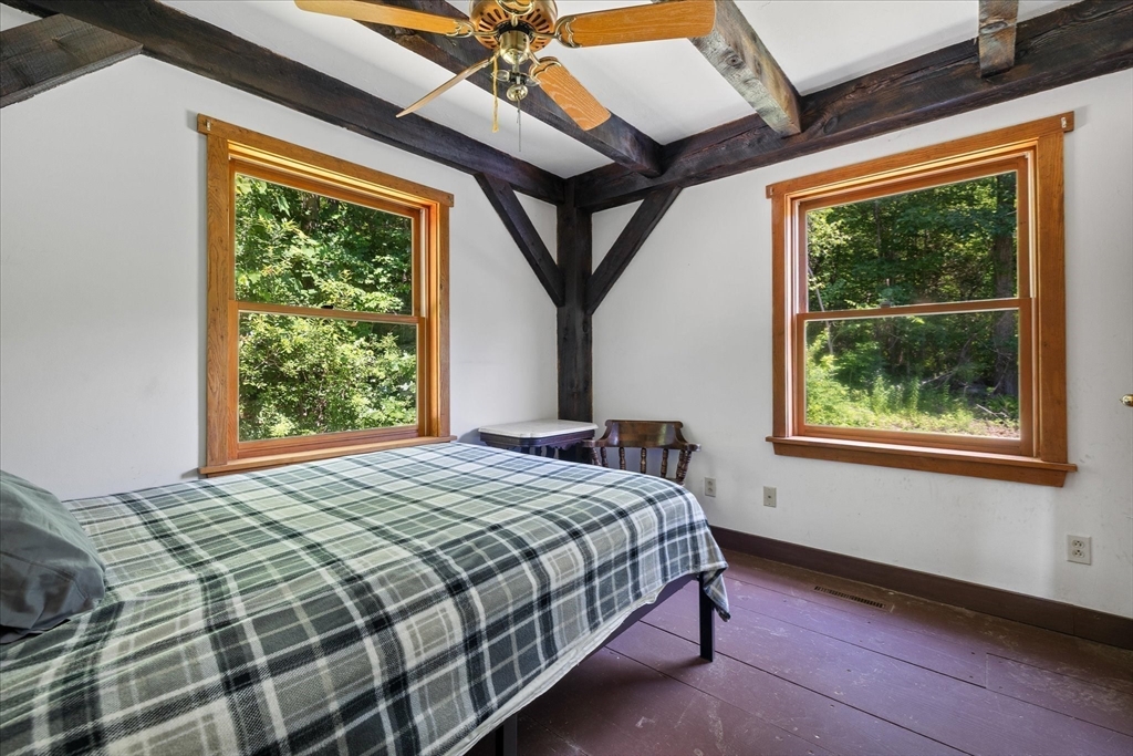 168 O'Neil Road West Warren, MA 01092 - Photo 34 of 42 a bedroom with a bed and a window
