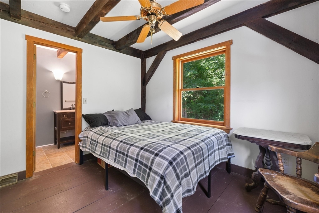 168 O'Neil Road West Warren, MA 01092 - Photo 35 of 42 a bedroom with a bed and a window