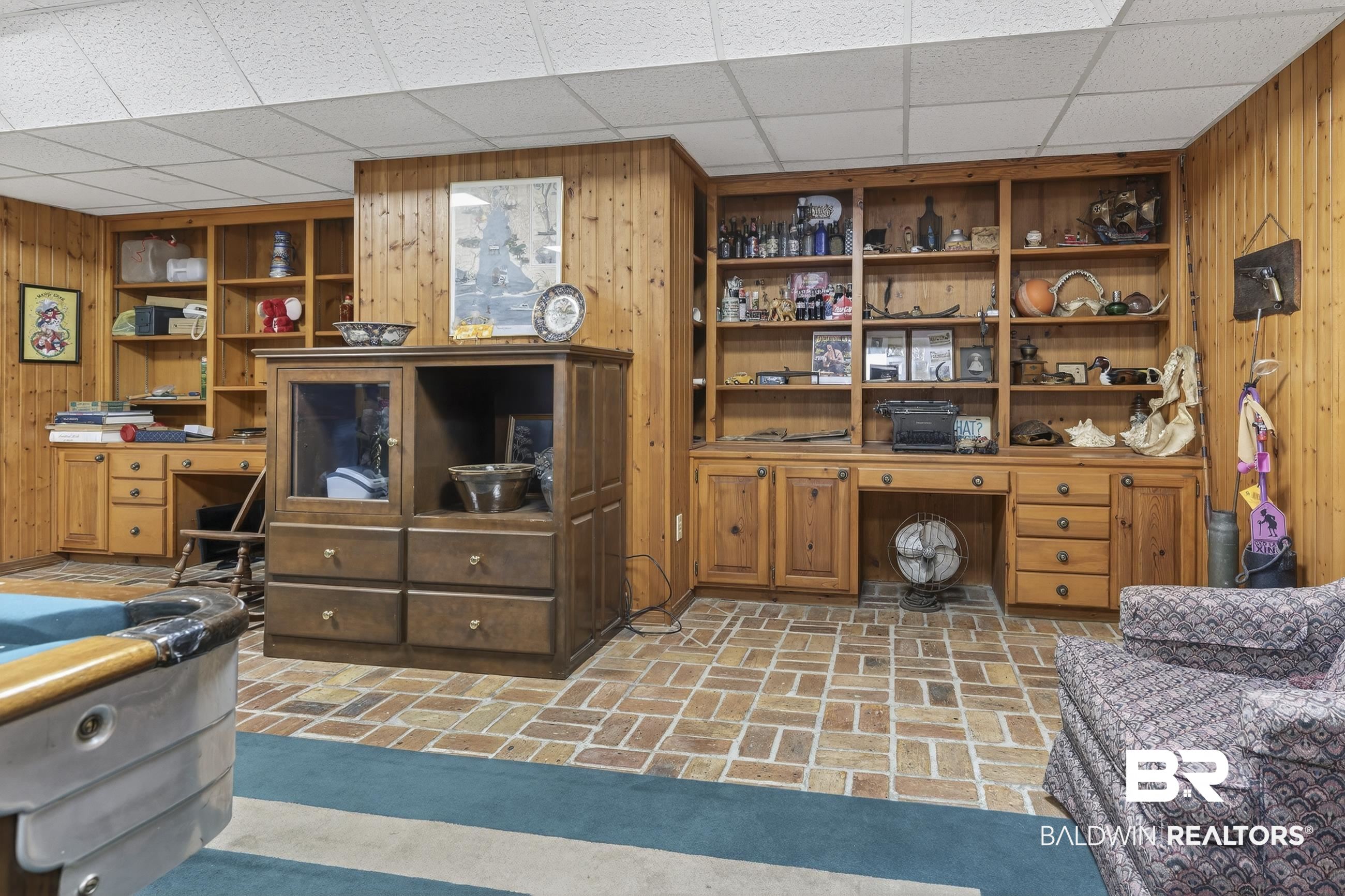 3175 Dawes Lake Road Mobile, AL 36619 - Photo 61 of 92 Office space featuring wooden walls, brick floors, and a paneled ceiling