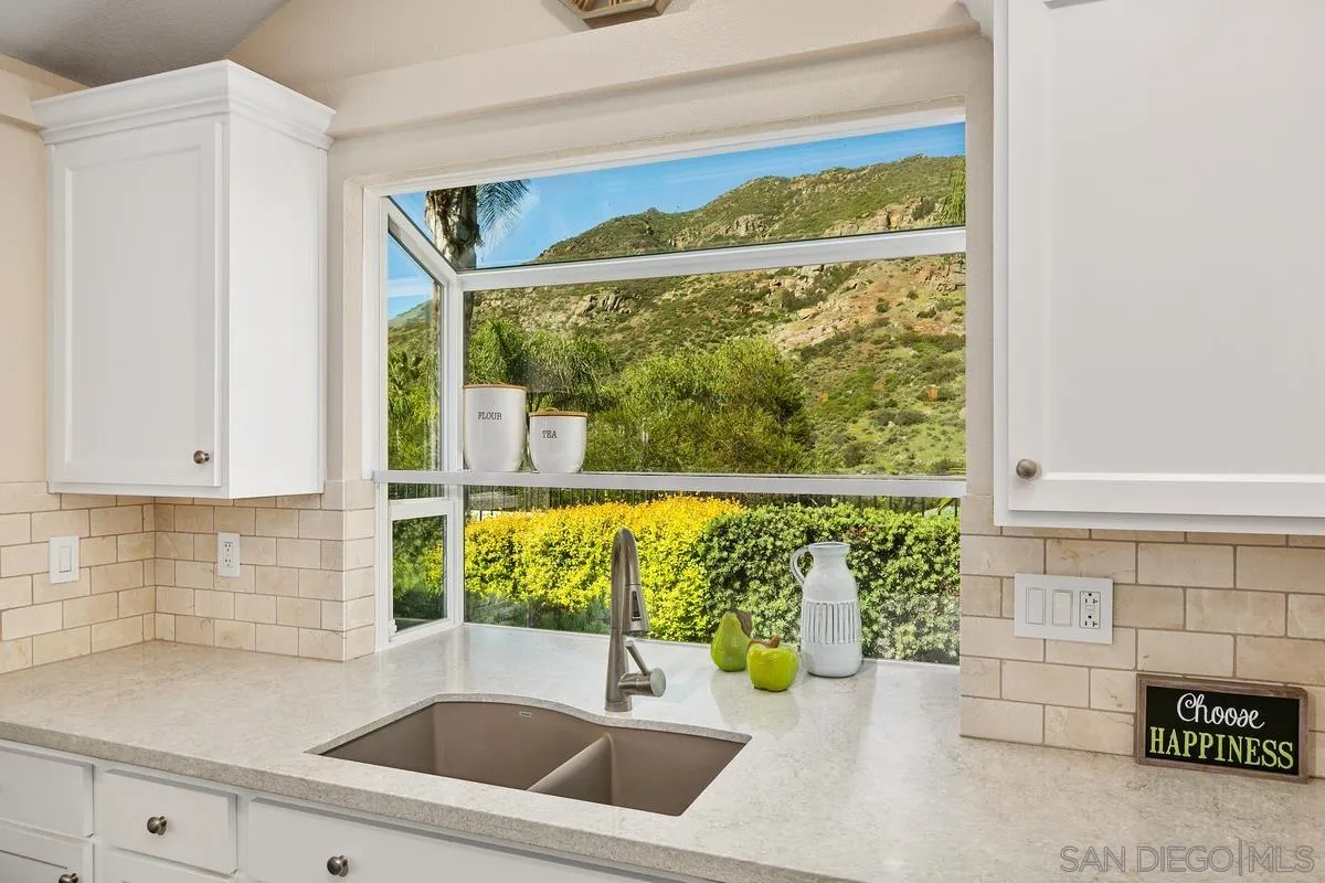 3330 Vista Rocosa Escondido, CA 92029 - Photo 11 of 29 a kitchen with a sink and large window