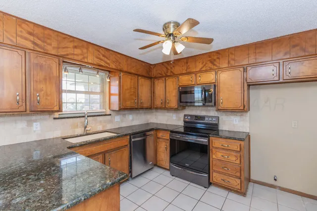 a hallway with cabinets