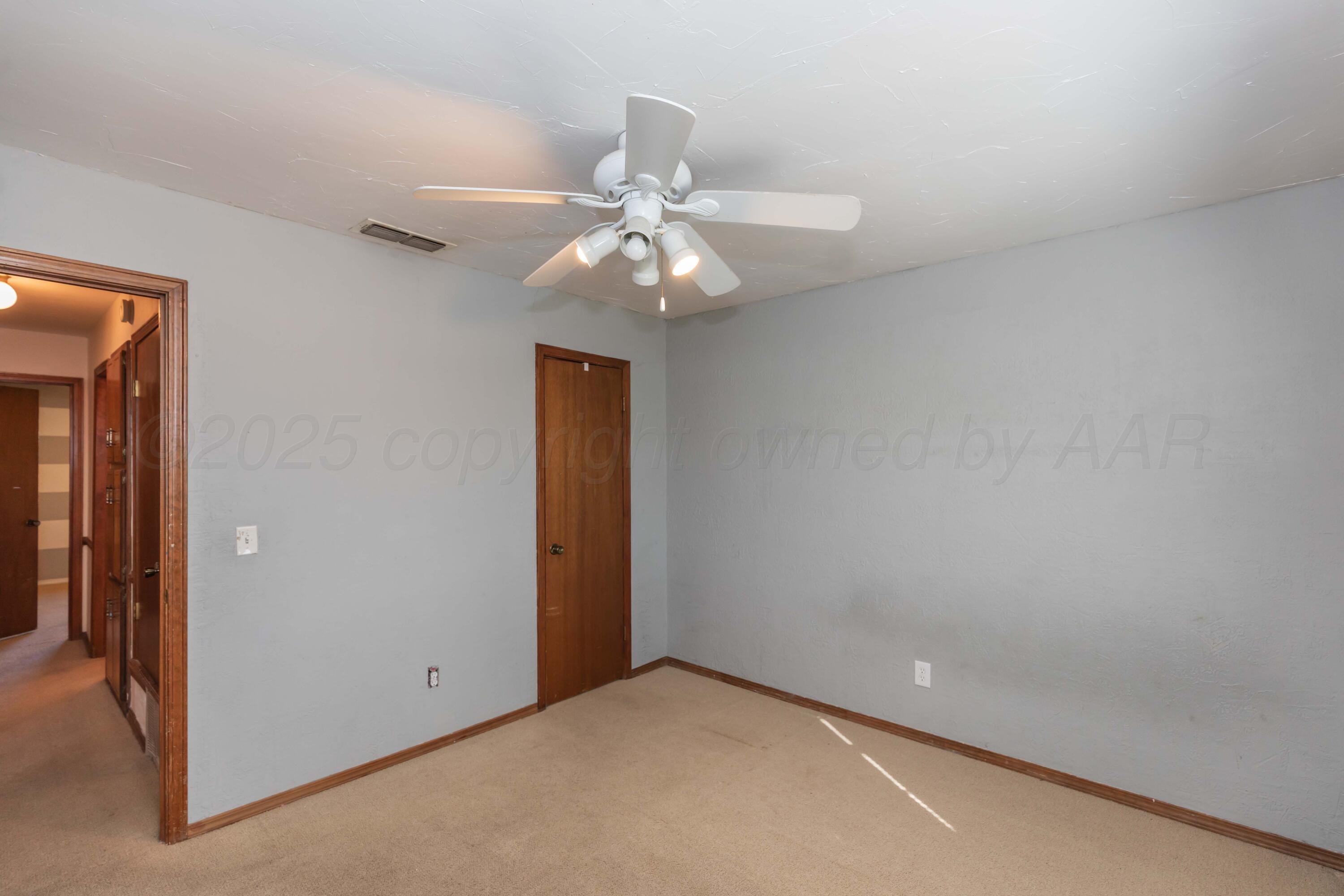 134 Eddie Street Canadian, TX 79014 - Photo 24 of 45 a view of an empty room with a window