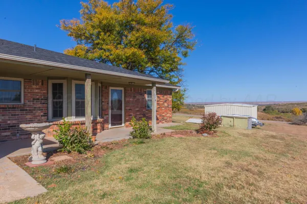 a backyard of a house with seating space
