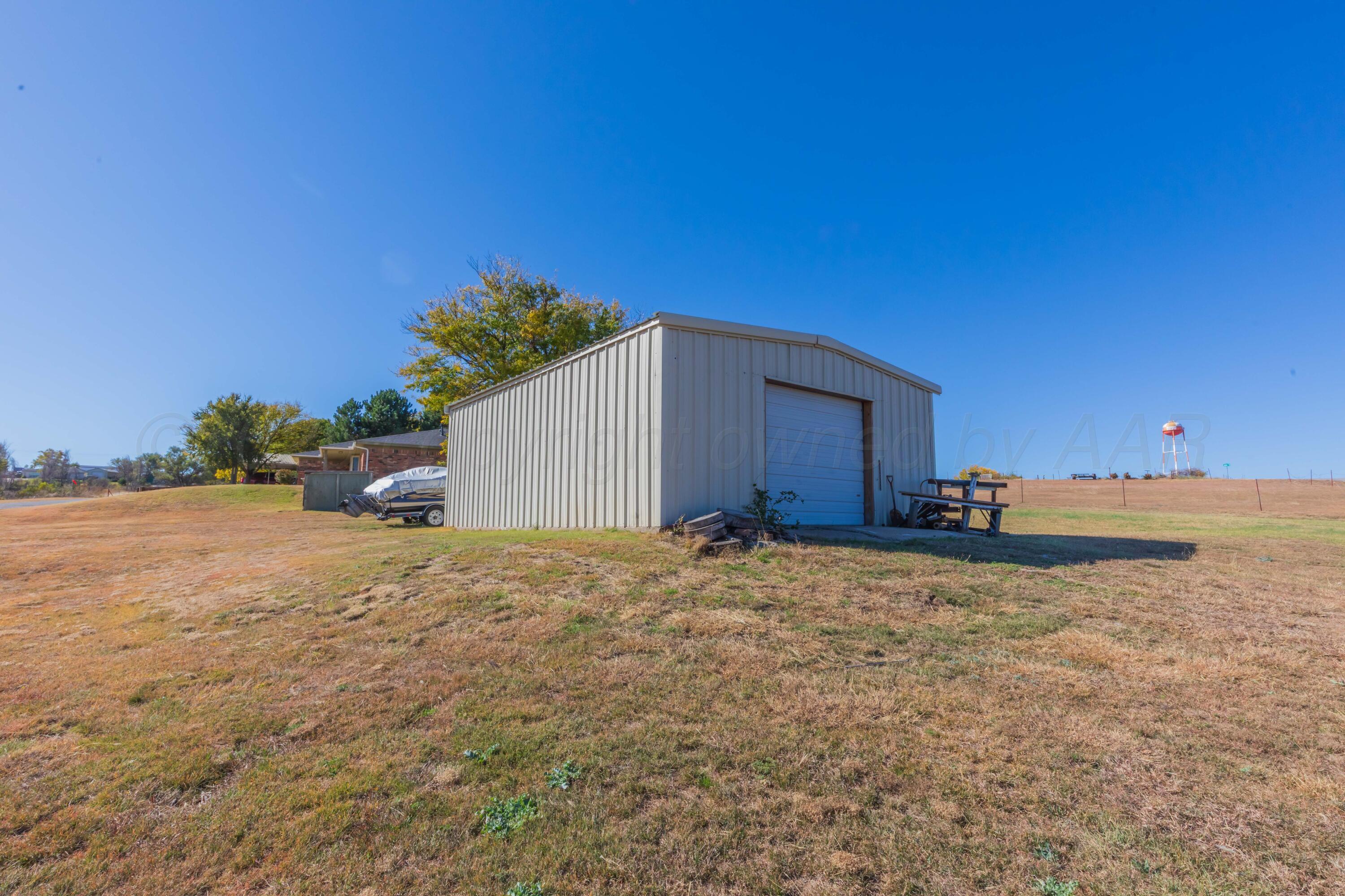 134 Eddie Street Canadian, TX 79014 - Photo 42 of 45 a house view with a backyard space