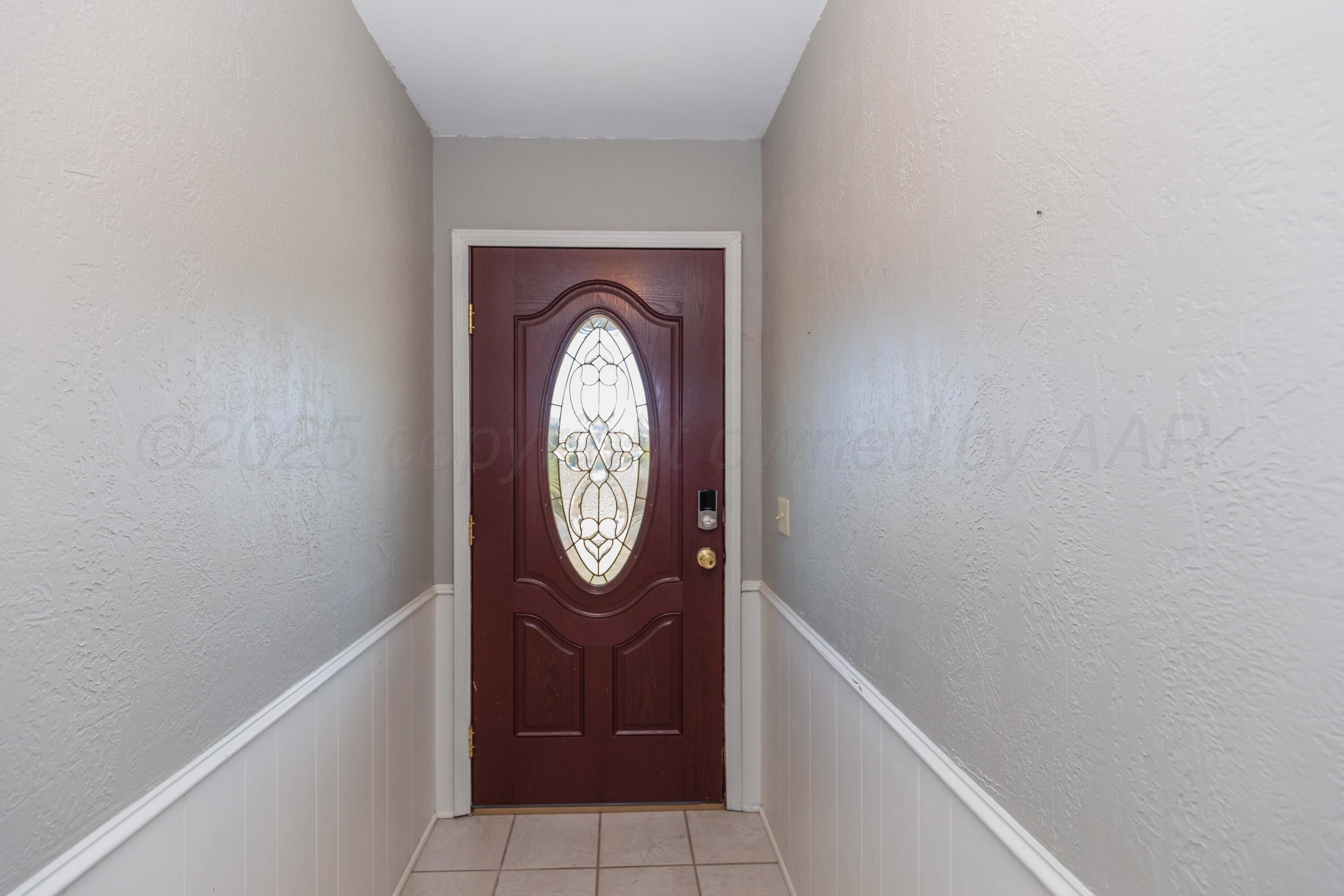 134 Eddie Street Canadian, TX 79014 - Photo 6 of 45 a view of a hallway with washer and dryer
