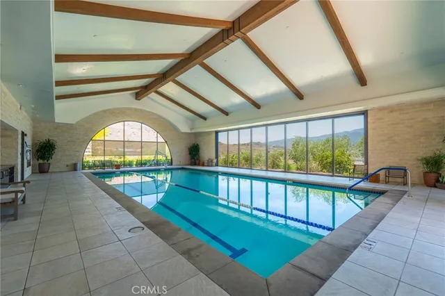 a view of staircase with a large window