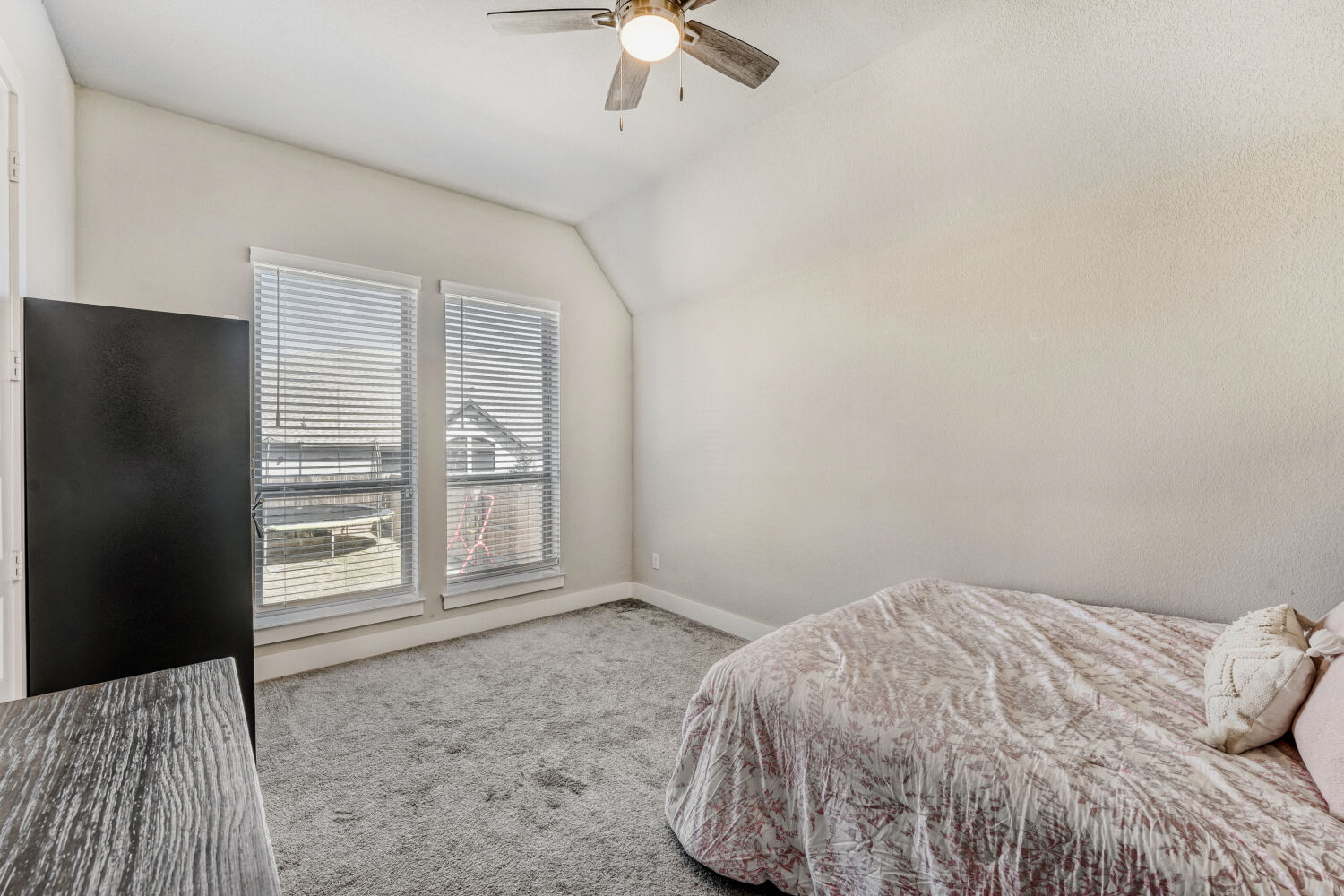 505 Trout River Road Kyle, TX 78640 - Photo 19 of 29 Bedroom with carpet floors, lofted ceiling, and a ceiling fan