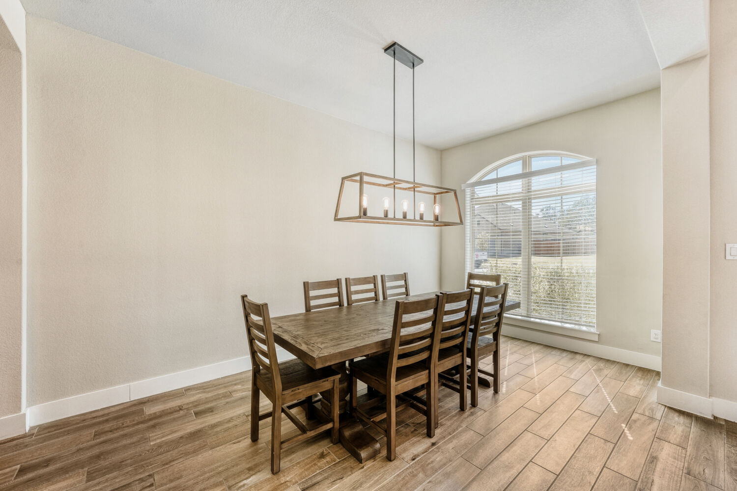 505 Trout River Road Kyle, TX 78640 - Photo 9 of 29 Dining room with wood finish floors and baseboards